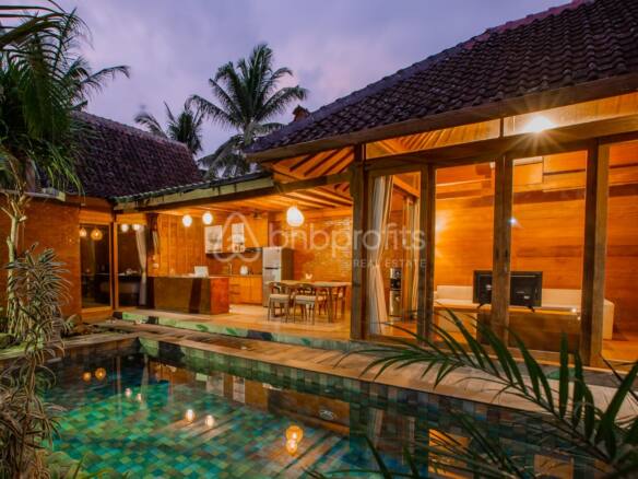 Your Peaceful Escape: Yearly Rental 2 Bed Villa with Wooden Lodge Design and Lush Views in Tabanan